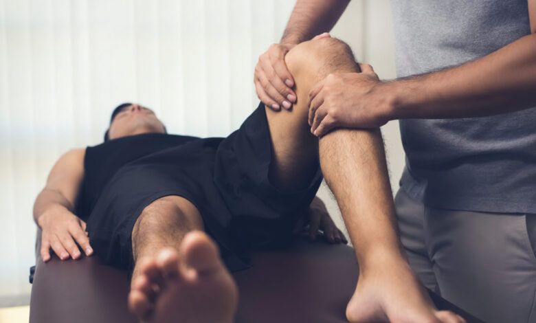 Man taking sports massage therapy