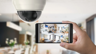 Man checking home security system